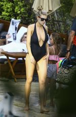CHARLOTTE MCKINNEY in Bikini at a Pool in Miami 02/18/2017