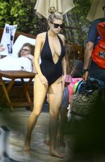 CHARLOTTE MCKINNEY in Bikini at a Pool in Miami 02/18/2017