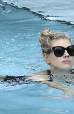 CHARLOTTE MCKINNEY in Bikini at a Pool in Miami 02/18/2017