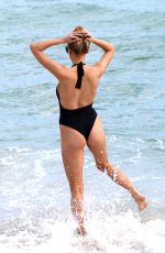 CHARLOTTE MCKINNEY in Swimsuit at a Beach in Miami 02 17/2017