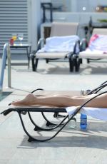 CHLOE GOODMAN in Bikini at a Pool in Tenerife 02/09/2017
