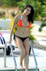 CHLOE GOODMAN in Bikini at a Pool in Tenerife 02/09/2017
