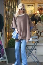 CLAUDIA SCHIFFER on the Set of a Photoshoot for Channel in Notting Hill february 02/22/2017