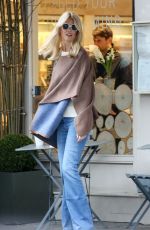 CLAUDIA SCHIFFER on the Set of a Photoshoot for Channel in Notting Hill february 02/22/2017