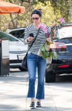 COURTENEY COX Shopping a Few Orchids at Farmer