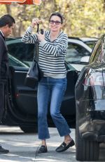 COURTENEY COX Shopping a Few Orchids at Farmer