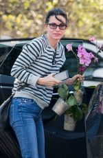COURTENEY COX Shopping a Few Orchids at Farmer