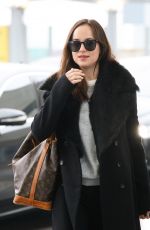DAKOTA JOHNSON at Heathrow Airport in London 02/10/2017