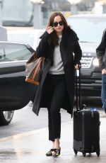 DAKOTA JOHNSON at Heathrow Airport in London 02/10/2017