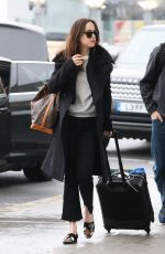 DAKOTA JOHNSON at Heathrow Airport in London 02/10/2017