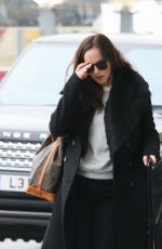 DAKOTA JOHNSON at Heathrow Airport in London 02/10/2017