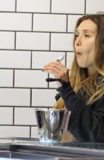 ELIZABETH OLSEN Eating Ice Cream at McConnell