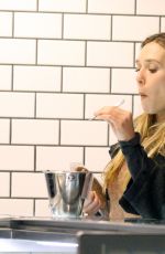 ELIZABETH OLSEN Eating Ice Cream at McConnell