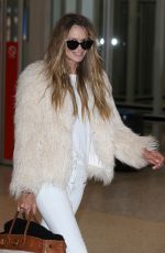 ELLE MACPHERSON at Airport in Melbourne 02/20/2017