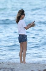 GIADA DE LAURENTIIS in Denim Shorts at a Beach in Miami 02/25/2017