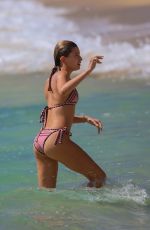 HAILEY BALDWIN in Bikini on the Beach in Hawaii 02/05/2017