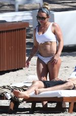 HILARY DUFF in Bikini on the Beach in Costa Rica 02/15/2017