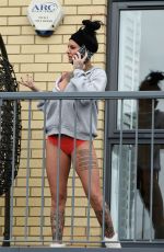 JEMMA LUCY on the Balcony of Her Apartment in Manchester 02/03/2017