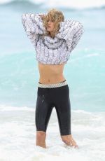 KARLIE KLOSS on the Set of a Photoshoot at Bondi Beach in Sydney 02/02/2017