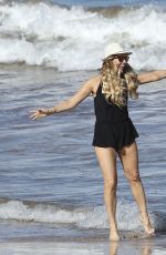 LEA MICHELE in Swimsuit Paddle Boarding in Hawaii 02/22/2017