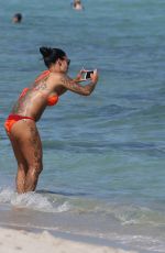 MARIA HERING and ISABEL QUESADA in Bikinis at a Beach in Miami 02/24/22017