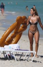 MARIA HERING and ISABEL QUESADA in Bikinis at a Beach in Miami 02/24/22017