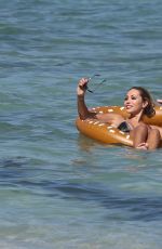 MARIA HERING and ISABEL QUESADA in Bikinis at a Beach in Miami 02/24/22017