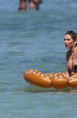 MARIA HERING and ISABEL QUESADA in Bikinis at a Beach in Miami 02/24/22017