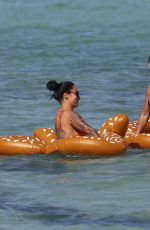 MARIA HERING and ISABEL QUESADA in Bikinis at a Beach in Miami 02/24/22017