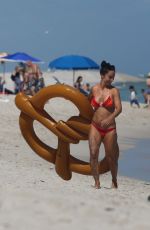MARIA HERING and ISABEL QUESADA in Bikinis at a Beach in Miami 02/24/22017