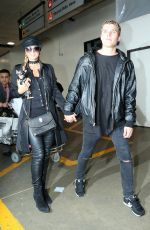 PARIS HILTON and Her Boyfriend Chris Zylka at Los Angeles International Airport 02/19/2017