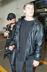 PARIS HILTON and Her Boyfriend Chris Zylka at Los Angeles International Airport 02/19/2017