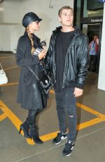 PARIS HILTON and Her Boyfriend Chris Zylka at Los Angeles International Airport 02/19/2017
