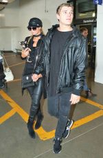 PARIS HILTON and Her Boyfriend Chris Zylka at Los Angeles International Airport 02/19/2017