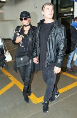 PARIS HILTON and Her Boyfriend Chris Zylka at Los Angeles International Airport 02/19/2017