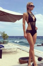 PARIS HILTON in Swimsuit in Maldives 02/15/2017