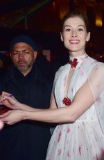 ROSAMUND PIKE Arrives at 