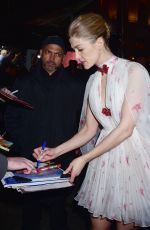 ROSAMUND PIKE Arrives at 