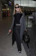 ROSAMUND PIKE at Heathrow Airport in London 02/03/2017