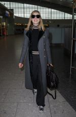 ROSAMUND PIKE at Heathrow Airport in London 02/03/2017
