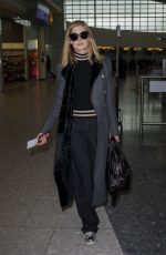 ROSAMUND PIKE at Heathrow Airport in London 02/03/2017