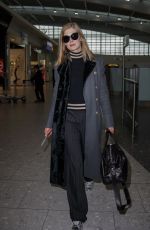 ROSAMUND PIKE at Heathrow Airport in London 02/03/2017