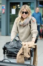 SIENNA MILLER at Heathrow Airport in London 02/15/2017