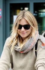 SIENNA MILLER at Heathrow Airport in London 02/15/2017