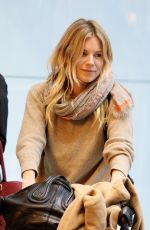 SIENNA MILLER at Heathrow Airport in London 02/15/2017