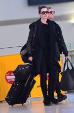 ANNE HATHAWAY at JFK Airport in New York 03/07/2017