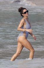 BROOKE BURKE in Swimsuit at a Beach in St. Barths 03/28/2017