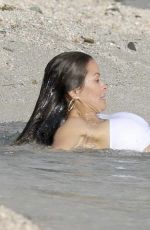 BROOKE BURKE in Swimsuit on the Beach in St. Barths 03/29/2017