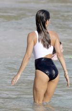 BROOKE BURKE in Swimsuit on the Beach in St. Barths 03/29/2017