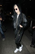 CARA DELEVINGNE Arrives at LAX Airport in Los Angeles 03/26/2017